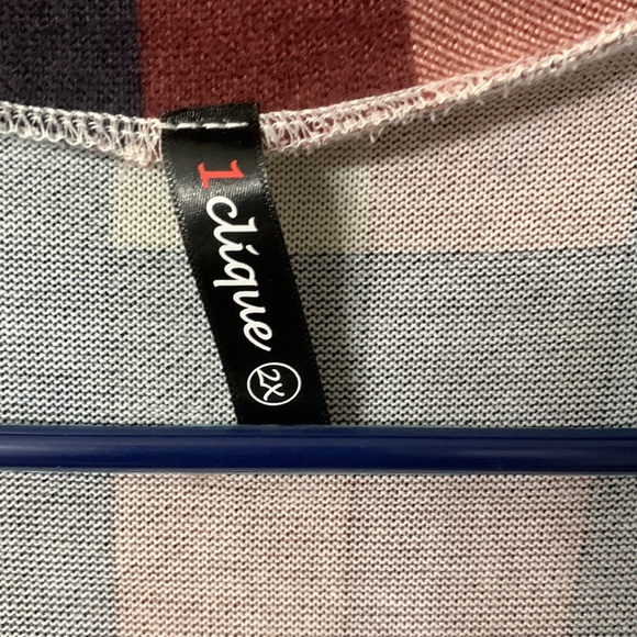 I’d say it’s a flannel but the material is much better. I wore 1x lost weight!! - Picture 2 of 4